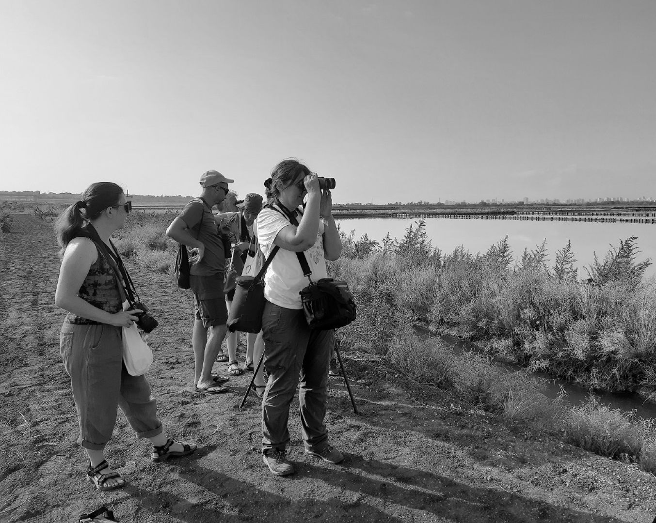 young people with binoculars